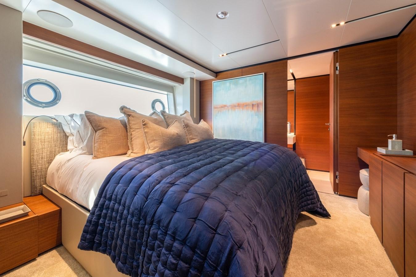 a bed in a room aboard MAC ONE Yacht for Sale