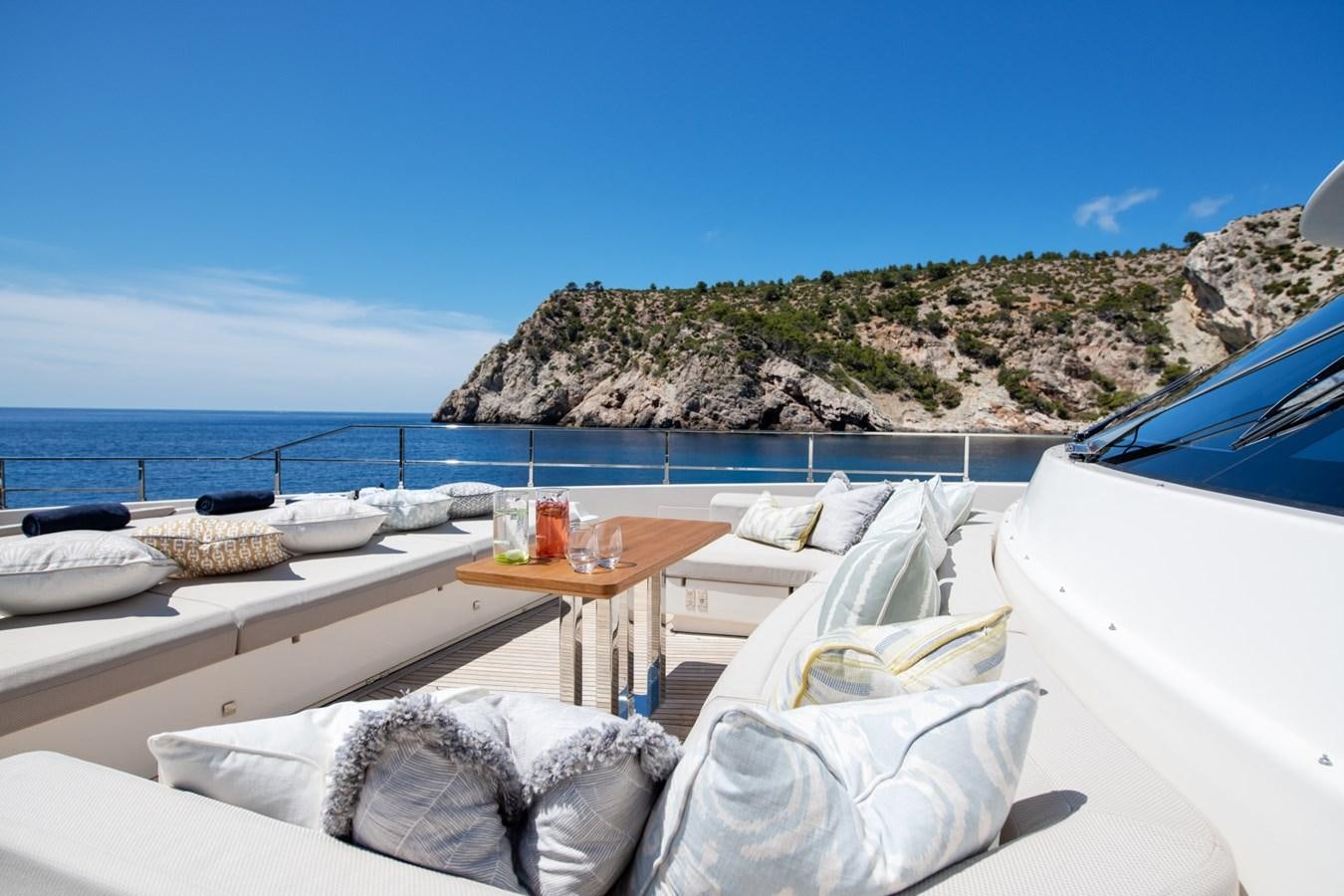 a table on a boat aboard MAC ONE Yacht for Sale