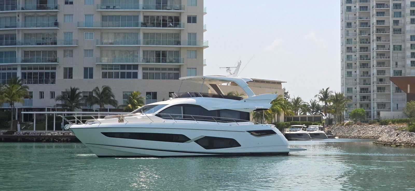 a white yacht in the water aboard GABY Yacht for Sale