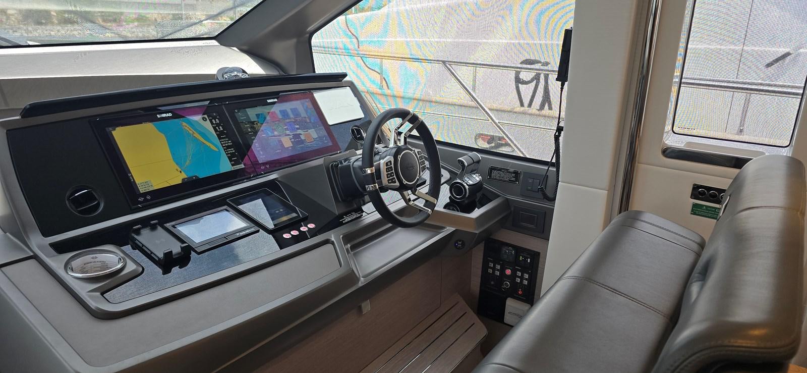 a car with a screen and buttons aboard GABY Yacht for Sale