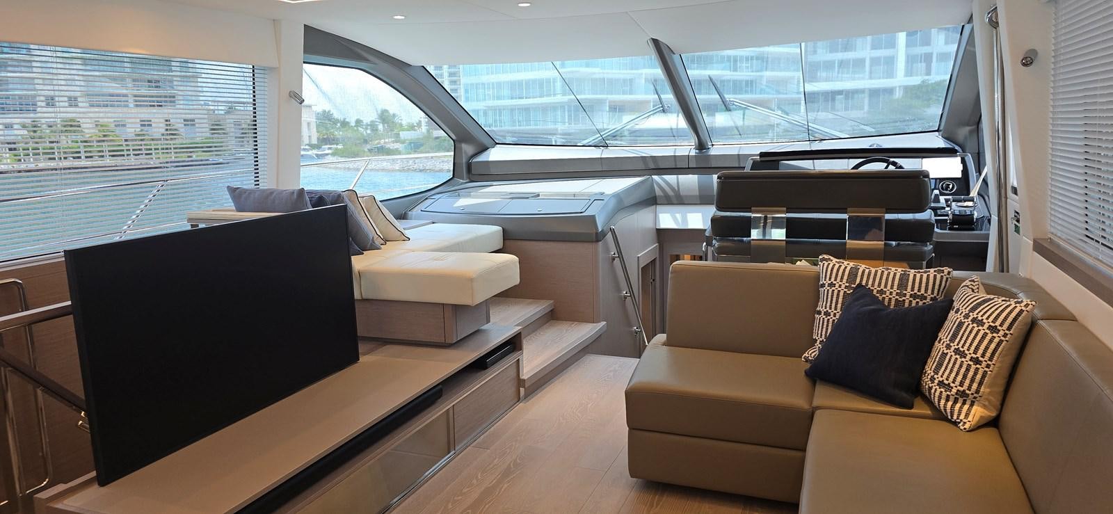 a living room with a large window aboard GABY Yacht for Sale