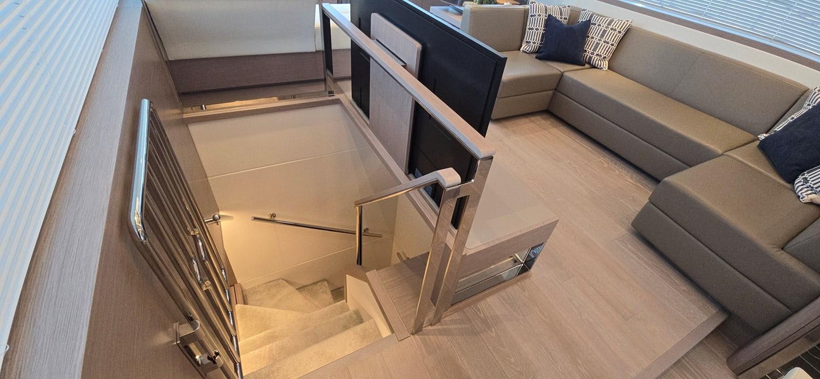 a wooden staircase in a room aboard GABY Yacht for Sale