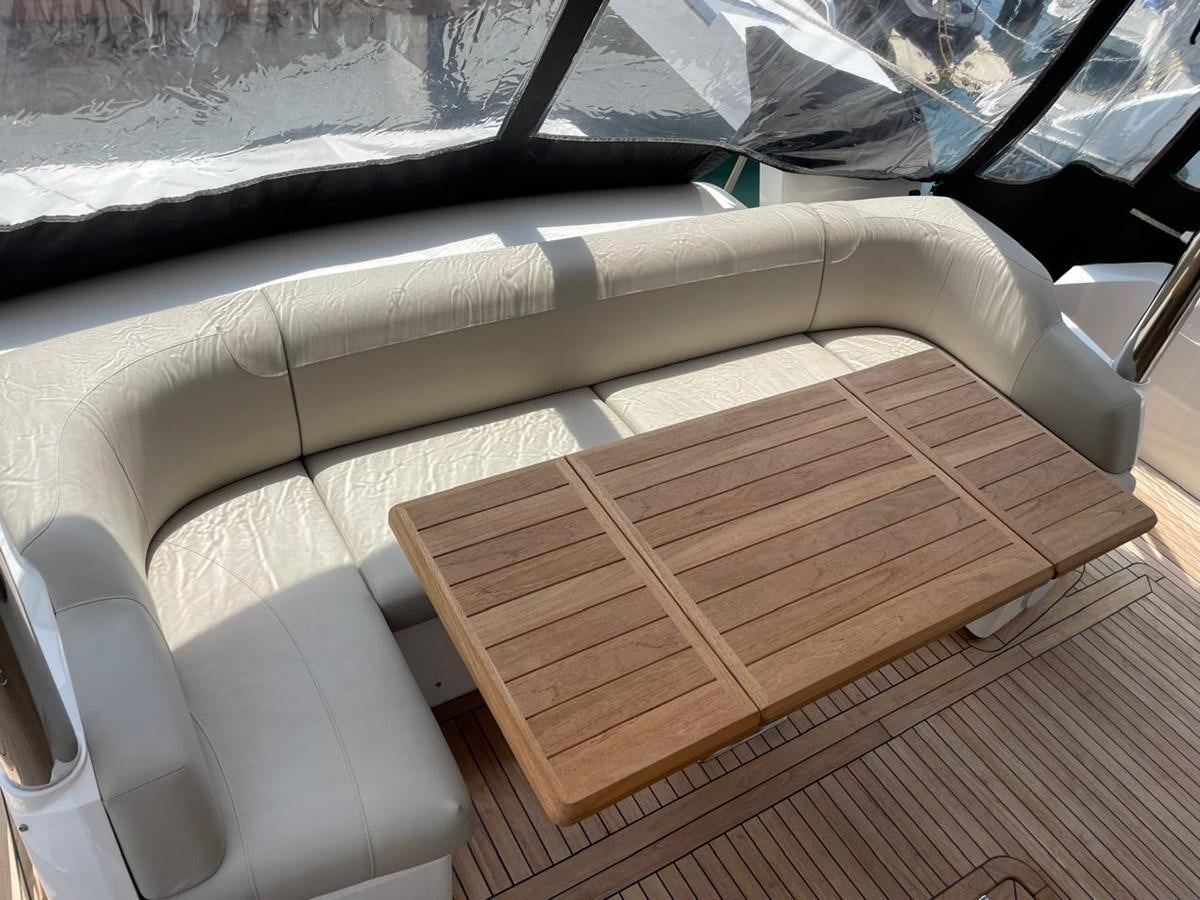 a white chair in a room aboard GABY Yacht for Sale
