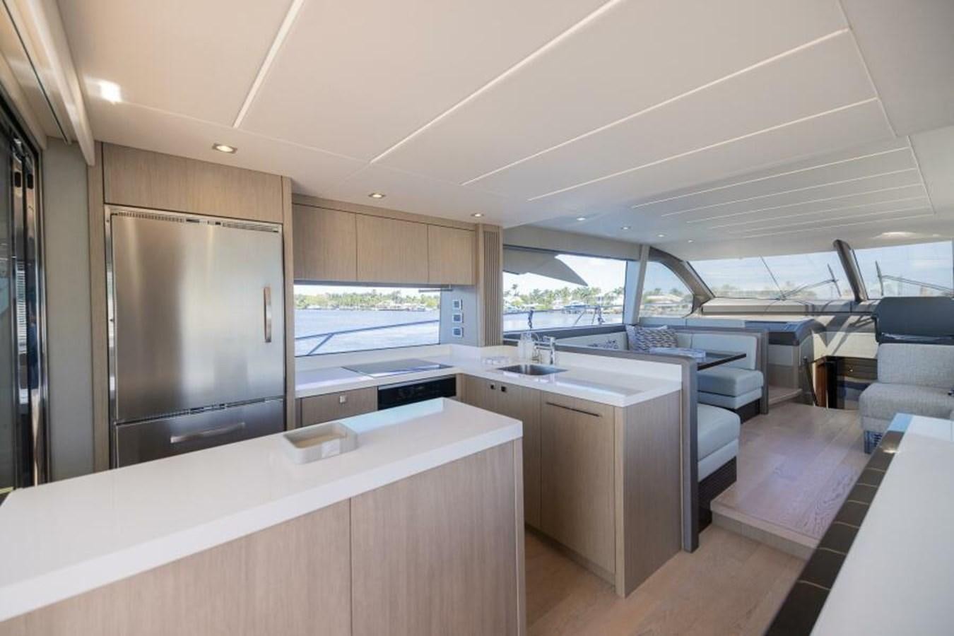 a kitchen with a large window aboard SEA ZAR Yacht for Sale