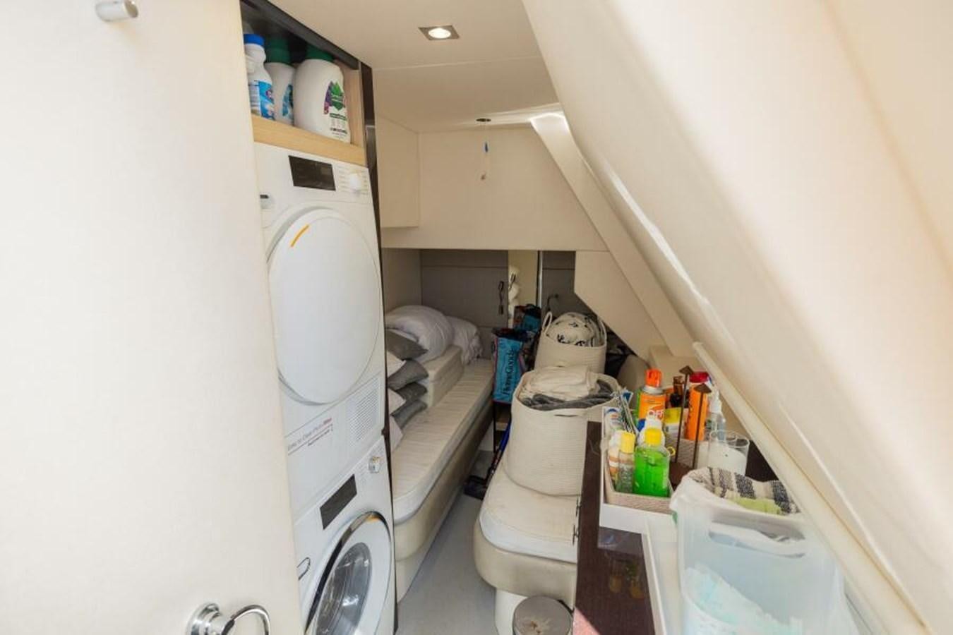 a small bathroom with a toilet and sink aboard SEA ZAR Yacht for Sale