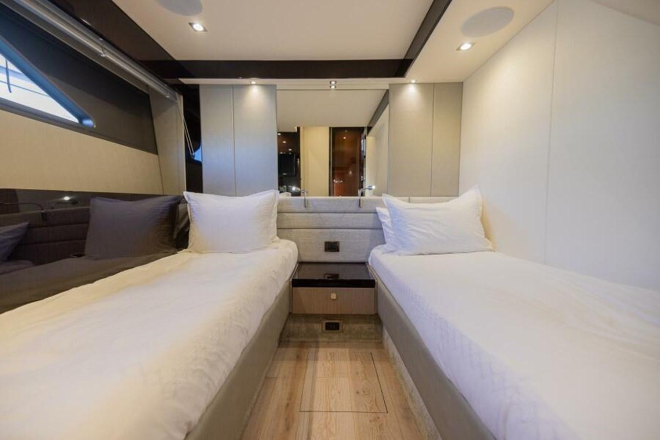 a room with two beds aboard SEA ZAR Yacht for Sale