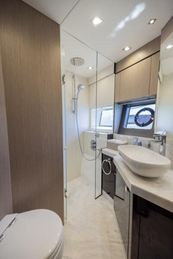 a bathroom with a sink and a toilet aboard SEA ZAR Yacht for Sale