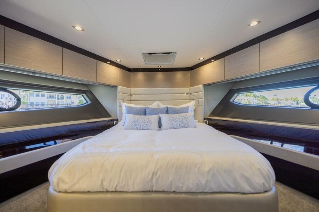 a bed in a room aboard SEA ZAR Yacht for Sale