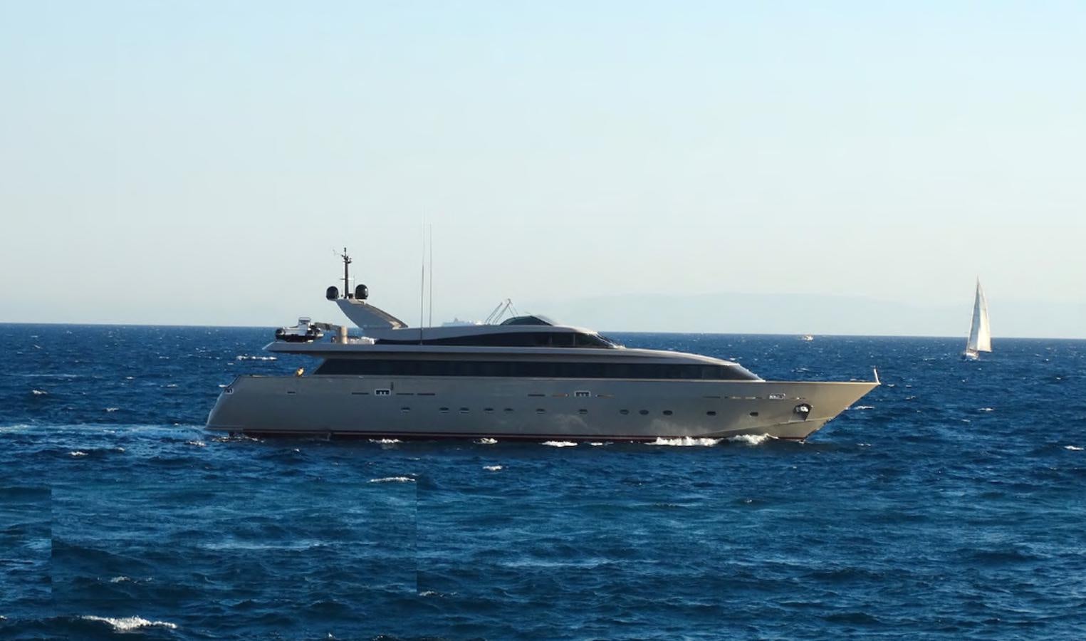 a large ship in the water aboard CHRISTINA V Yacht for Sale