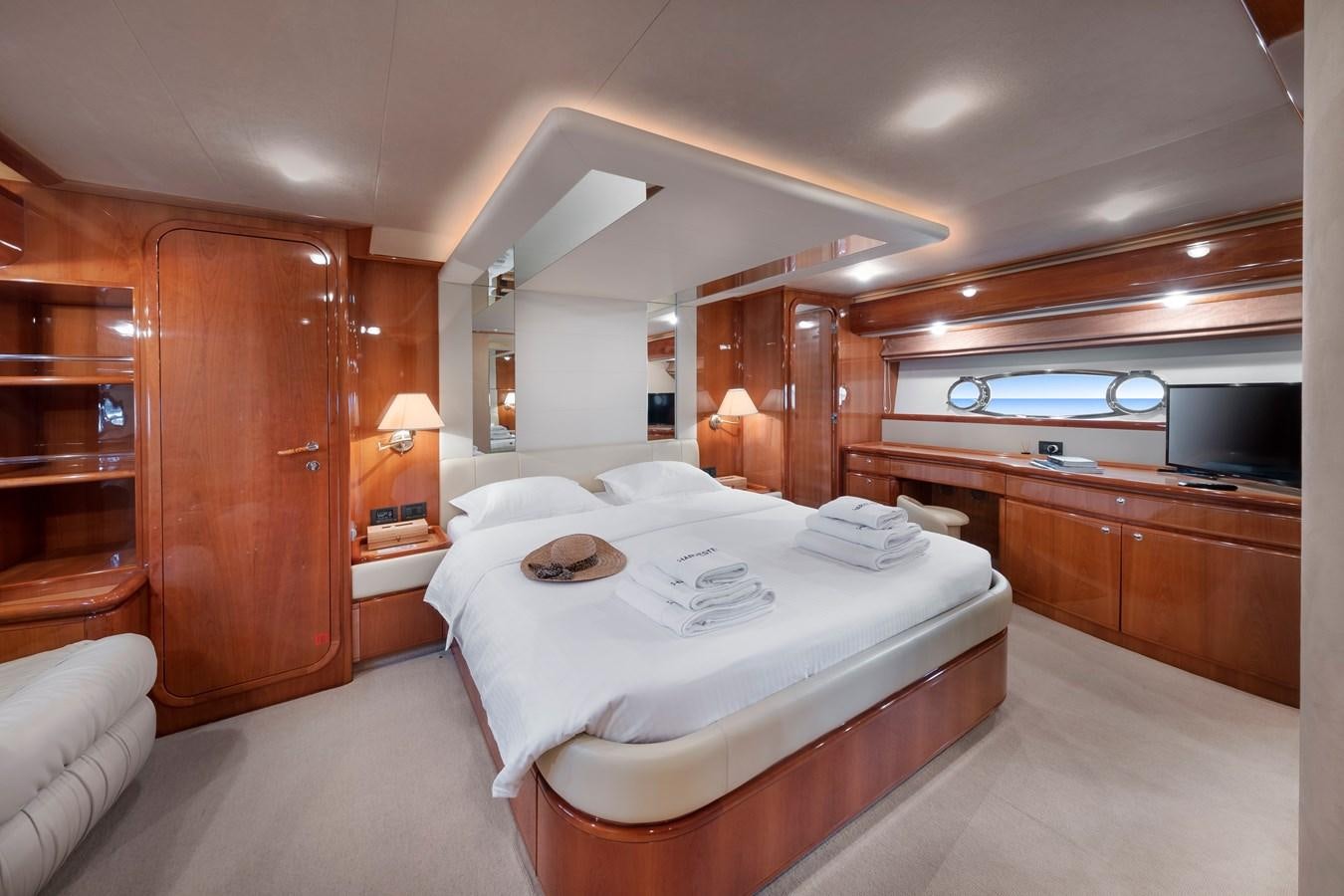 a room with two beds aboard HARVESTER Yacht for Sale