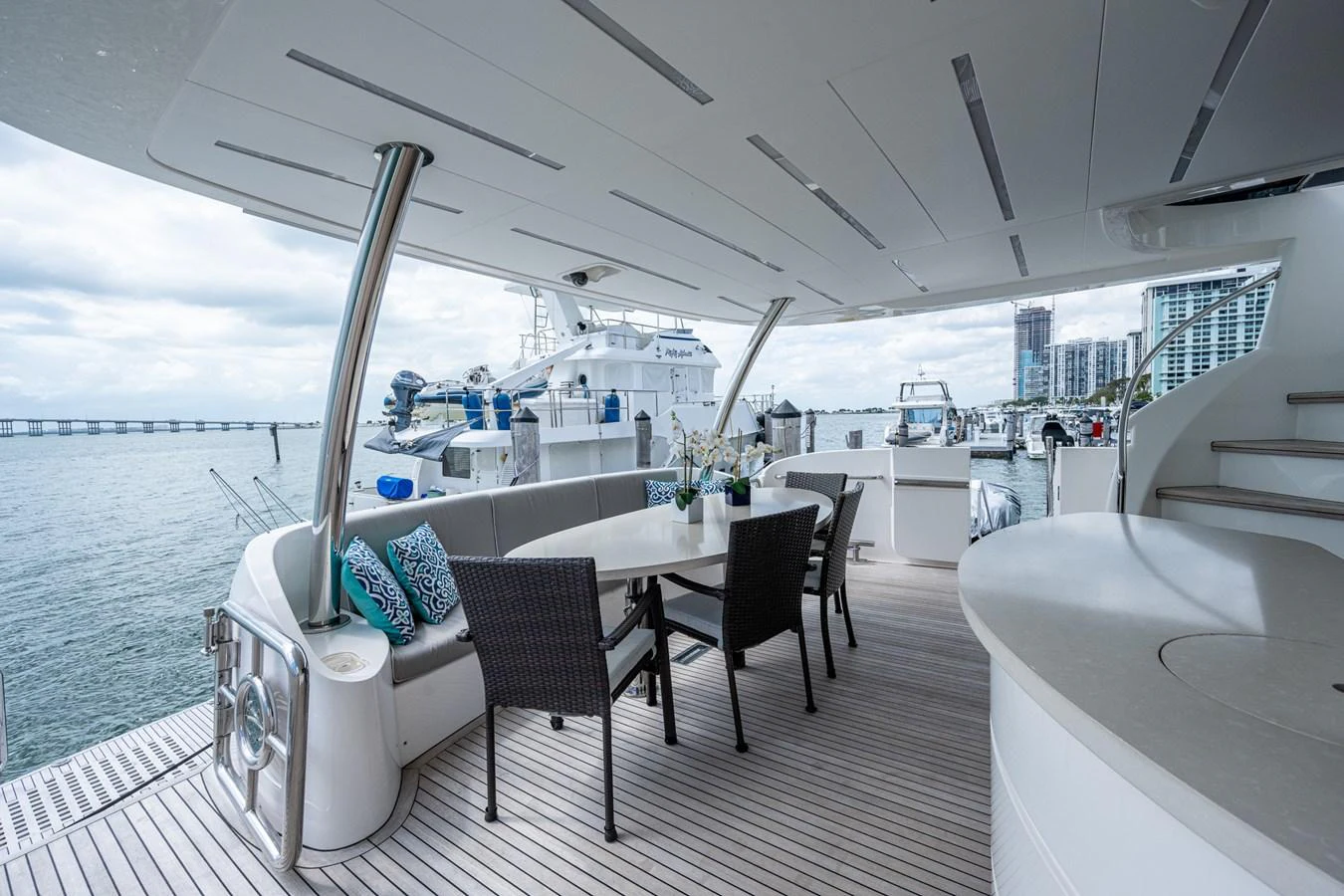 a boat with a table and chairs aboard MOIRA CINCO Yacht for Sale