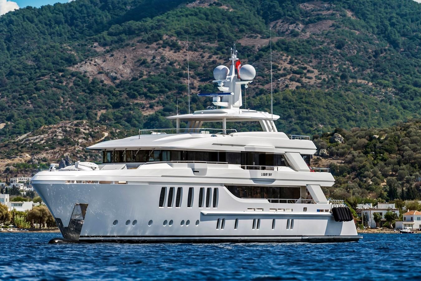 a large white boat in the water aboard LIQUID SKY Yacht for Sale