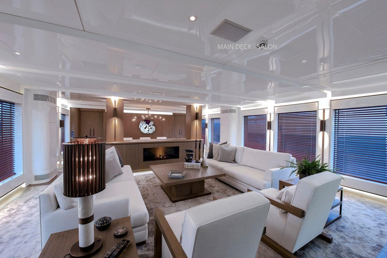 a living room with white furniture aboard LIQUID SKY Yacht for Sale