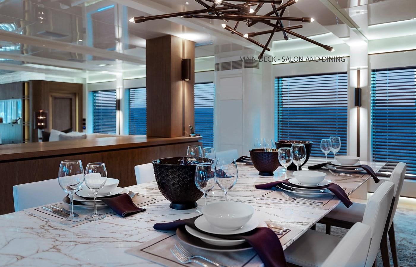 a dining room with a table set aboard LIQUID SKY Yacht for Sale
