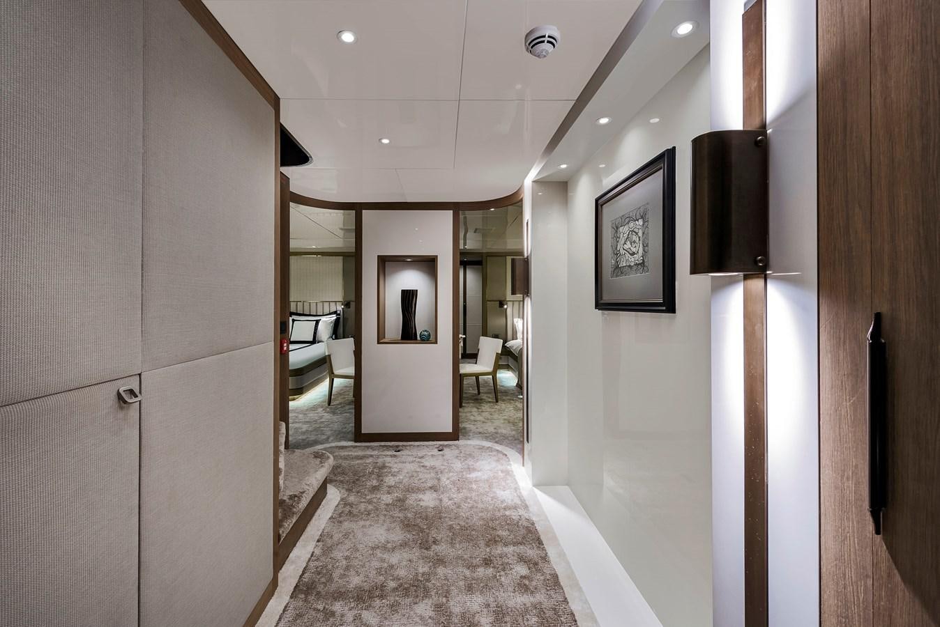 a hallway with a large mirror aboard LIQUID SKY Yacht for Sale