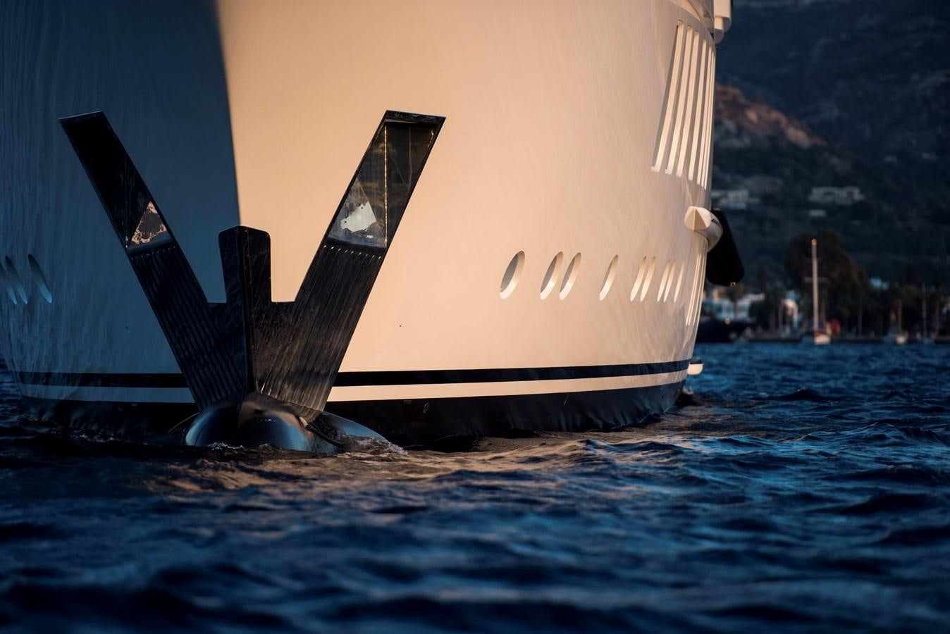a large sailboat in the water aboard LIQUID SKY Yacht for Sale