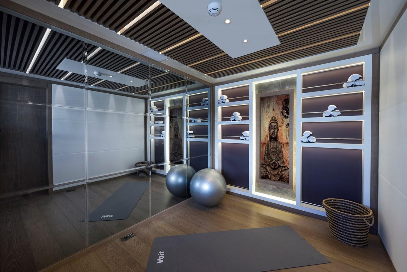 a room with a large painting aboard LIQUID SKY Yacht for Sale