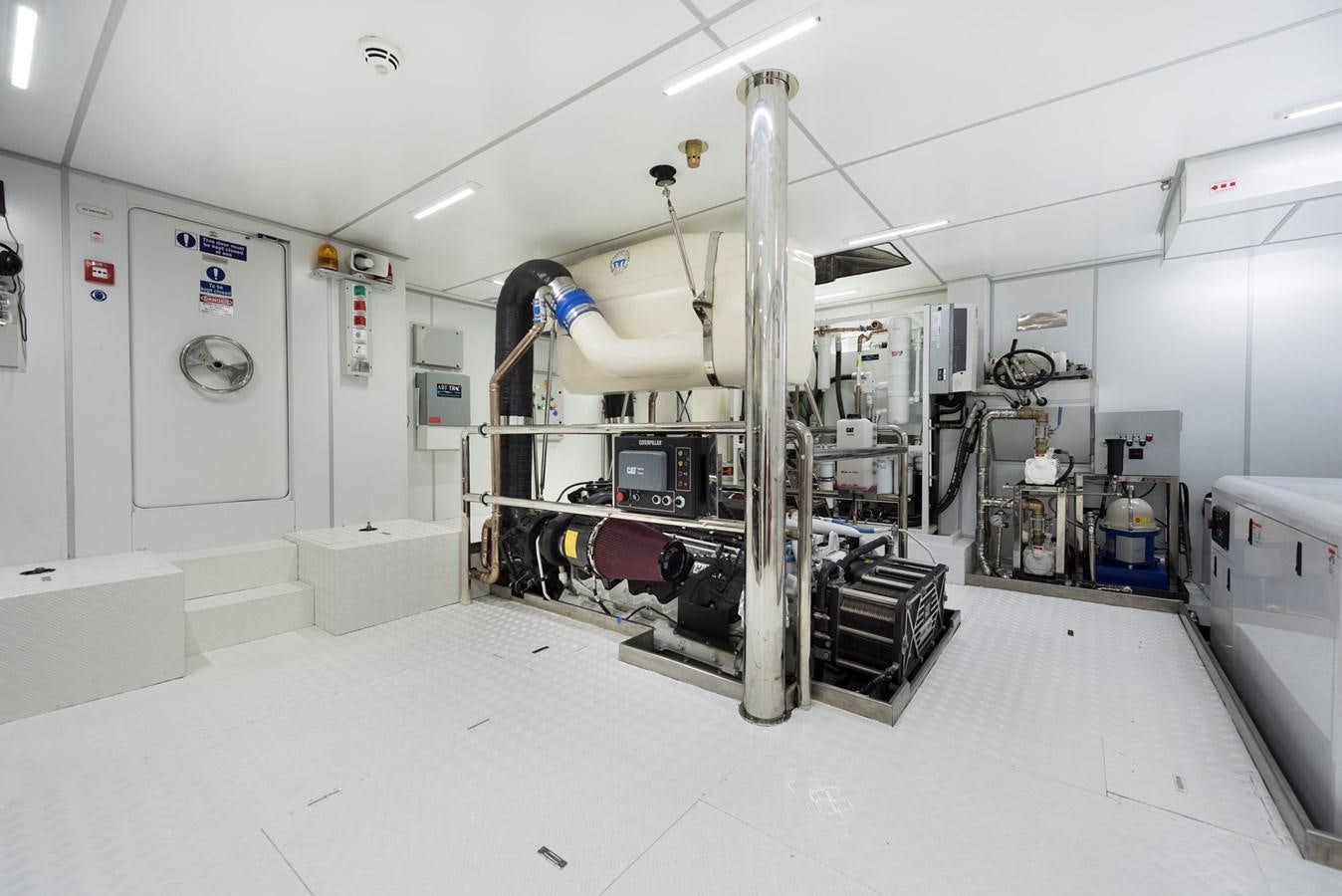 a large machine in a factory aboard LIQUID SKY Yacht for Sale