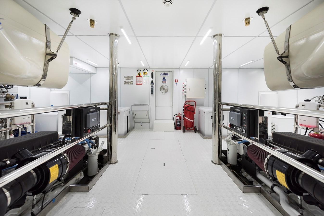 a room with several machines aboard LIQUID SKY Yacht for Sale