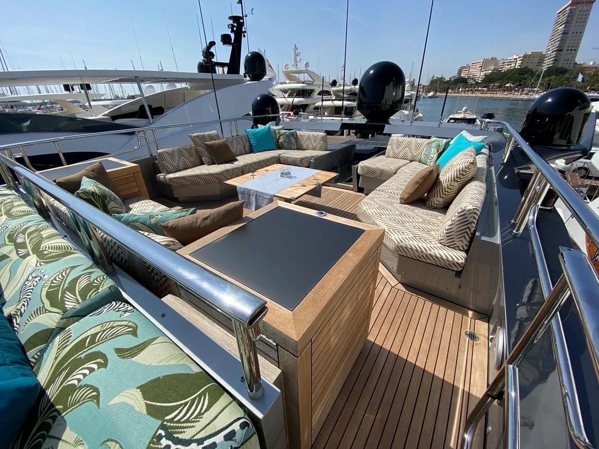 a deck with a deck and a boat on it aboard ESCAPE Yacht for Sale