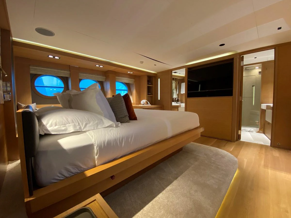a bed in a room aboard ESCAPE Yacht for Sale