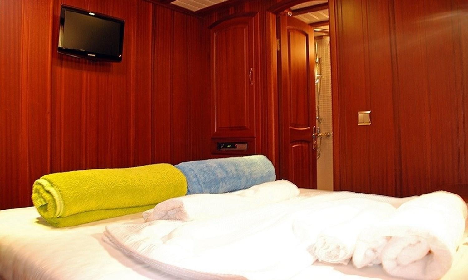 a room with wooden walls aboard ATALANTE Yacht for Sale