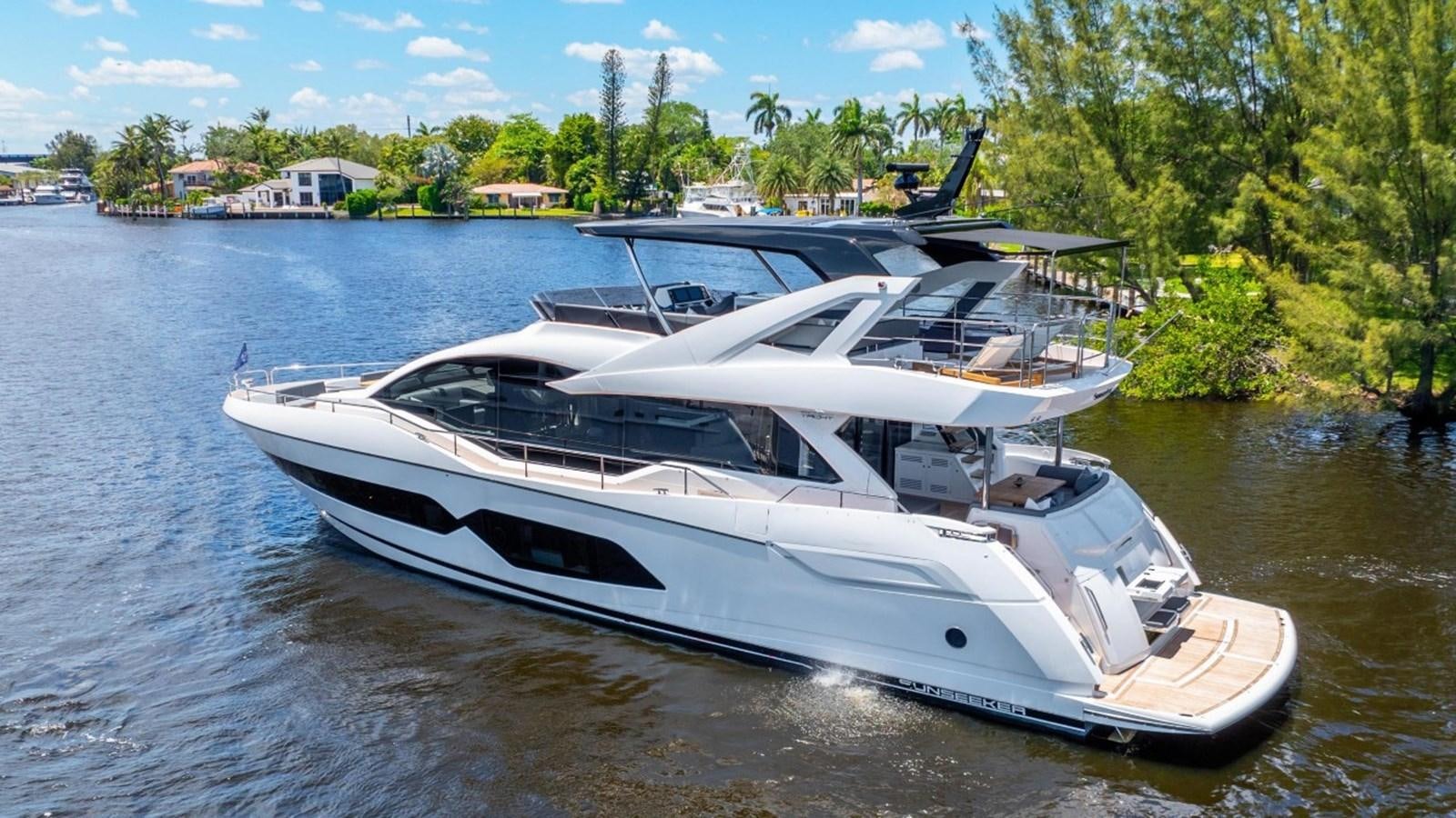 a white yacht on a river aboard 76 YACHT Yacht for Sale