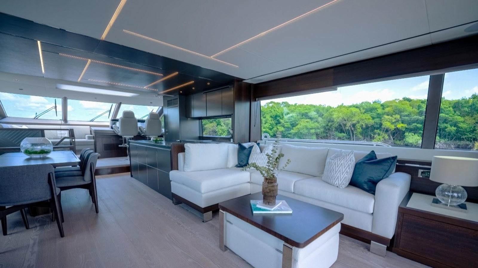 a living room with a couch and a table aboard 76 YACHT Yacht for Sale