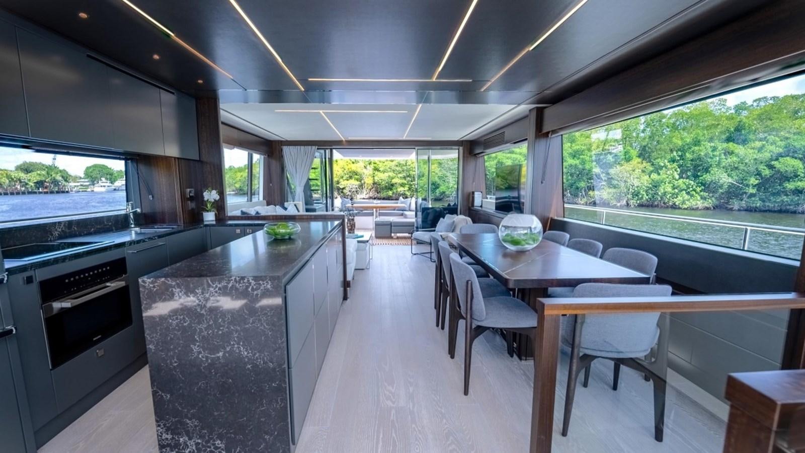 a kitchen and dining area aboard 76 YACHT Yacht for Sale