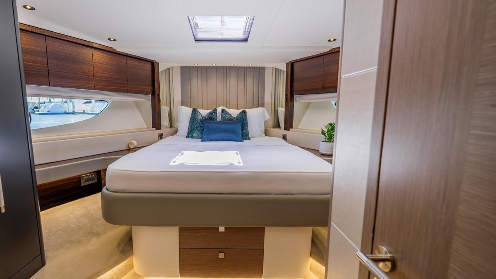 a room with a bed and a window aboard 76 YACHT Yacht for Sale
