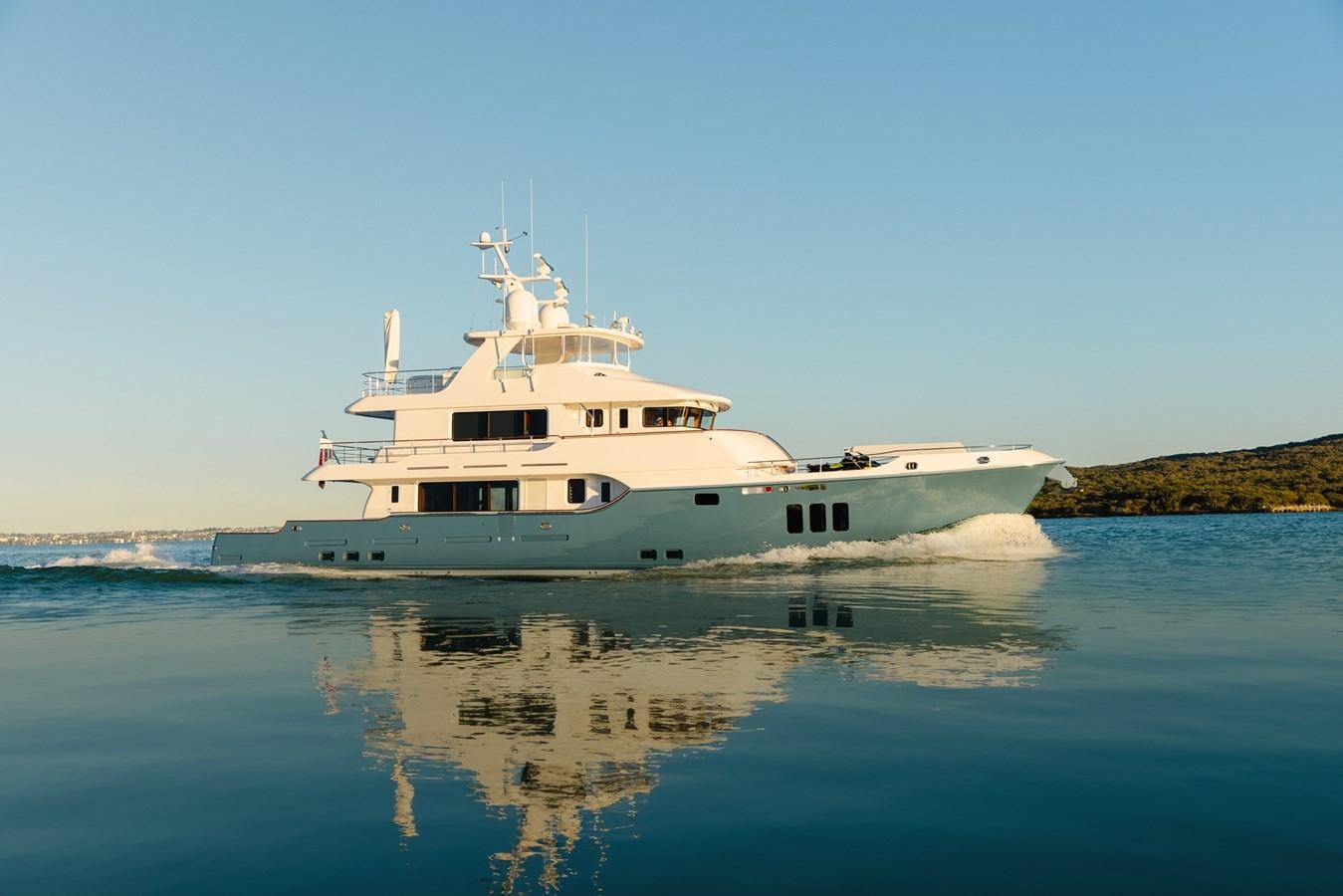a white boat on water aboard SERENITY Yacht for Sale