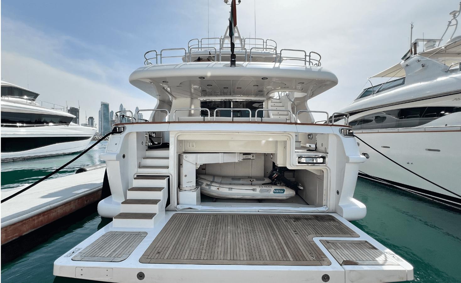 a group of boats in a harbor aboard 2008 BENETTI 100 Yacht for Sale