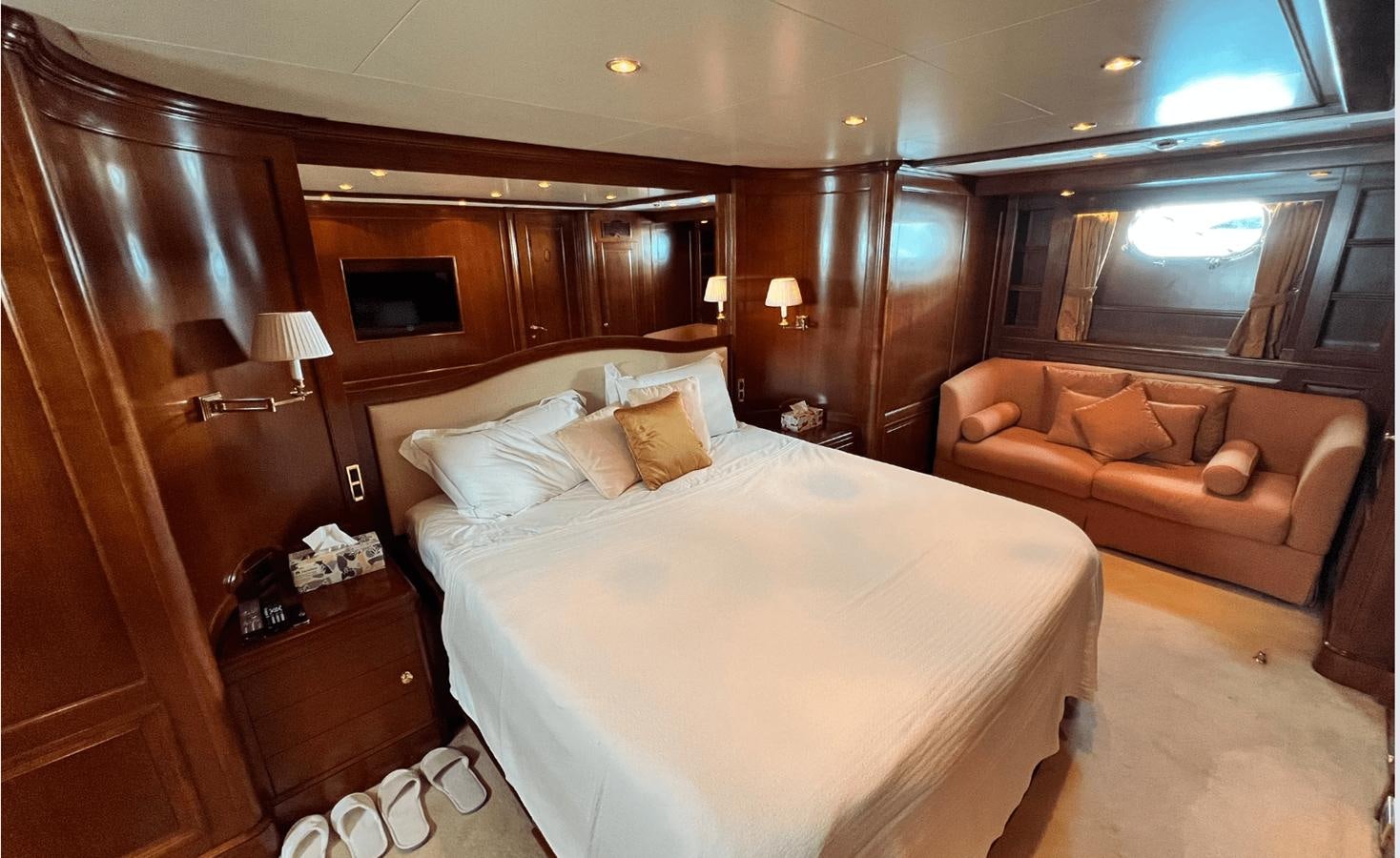 a hotel room with a bed and a couch aboard 2008 BENETTI 100 Yacht for Sale