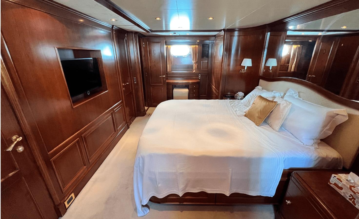 a bed in a room aboard 2008 BENETTI 100 Yacht for Sale