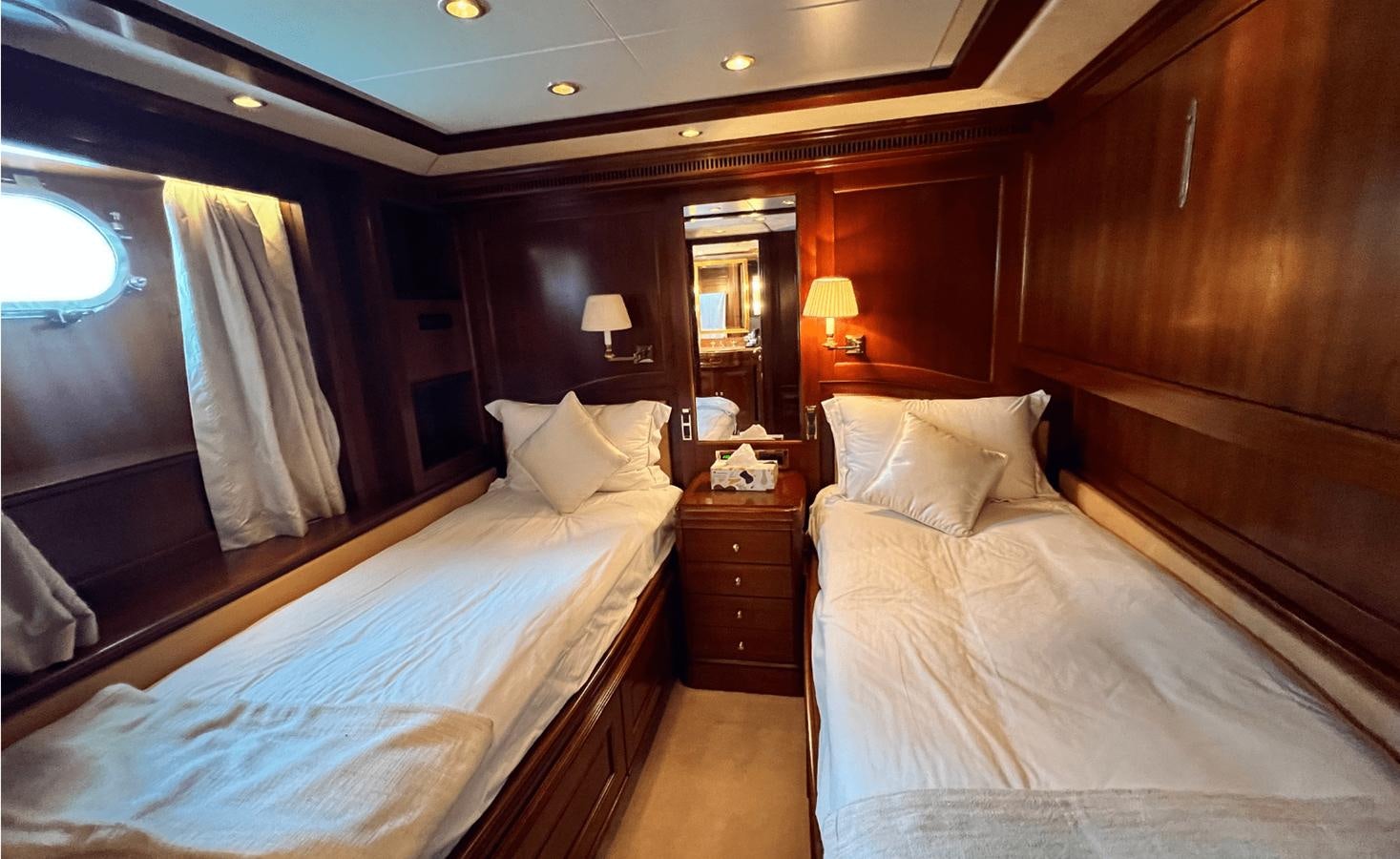 a room with two beds aboard 2008 BENETTI 100 Yacht for Sale