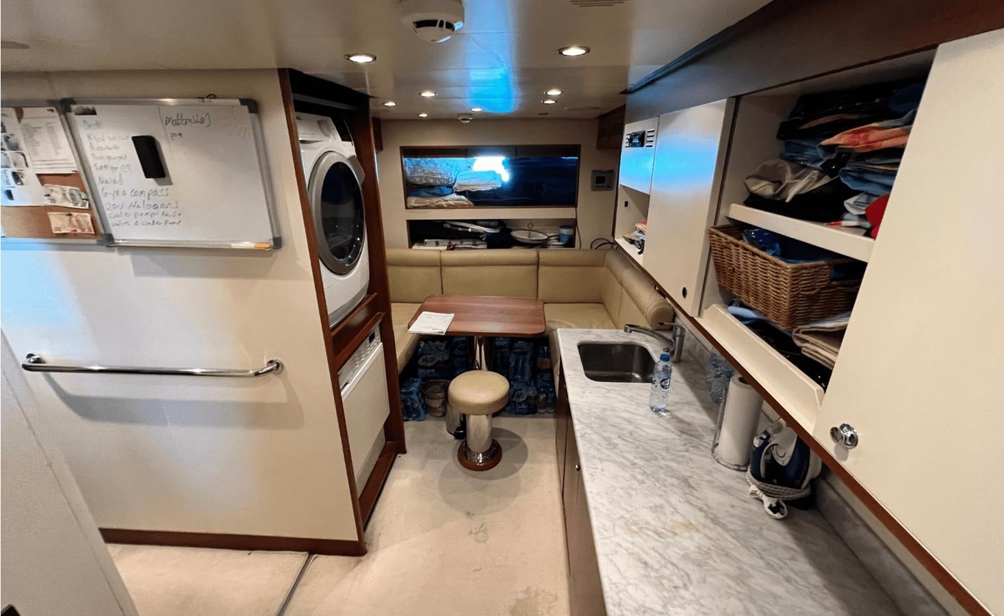 a kitchen with a counter and sink aboard 2008 BENETTI 100 Yacht for Sale