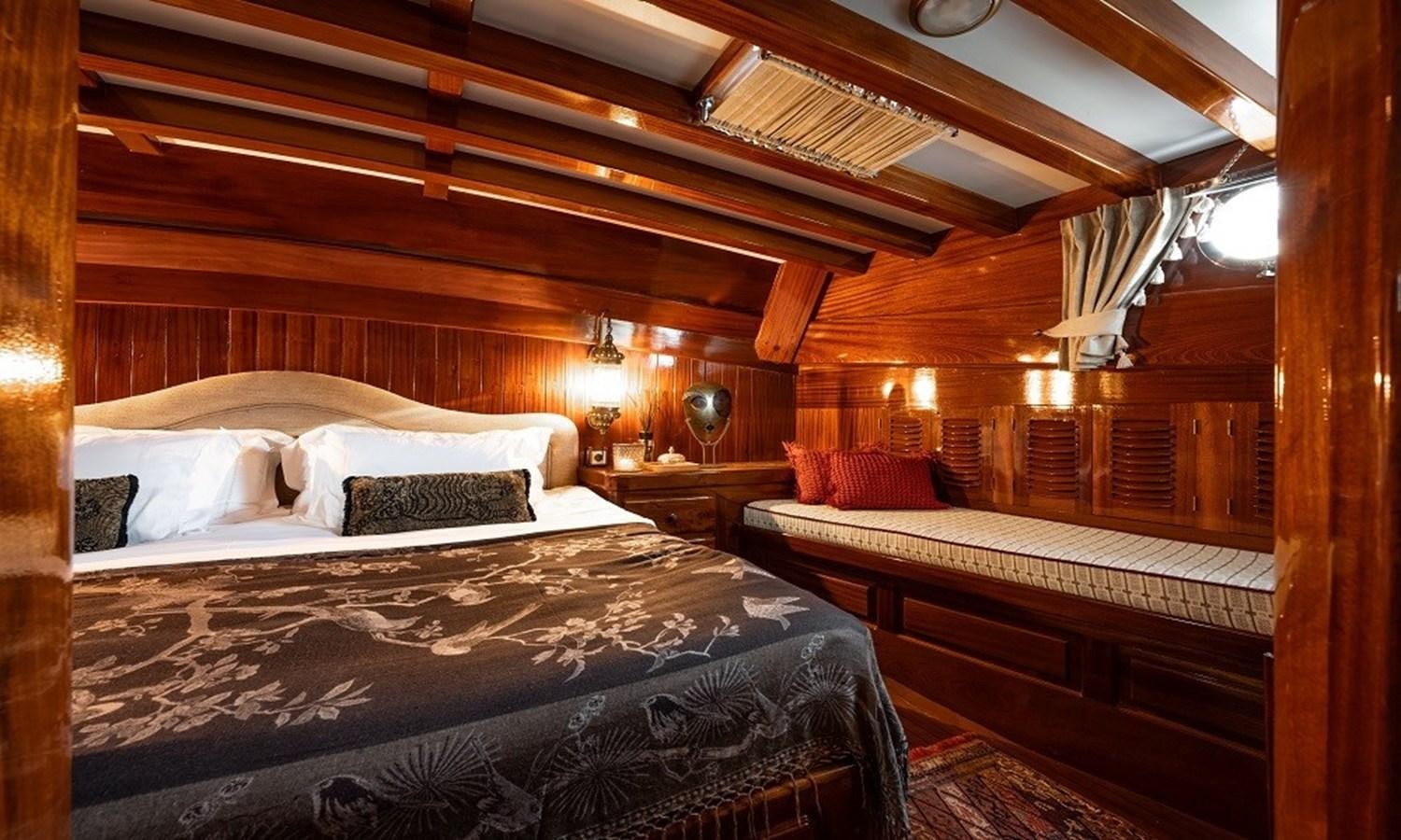 a room with two beds aboard CUSTOM MADE 30 M MOTORSAILOR Yacht for Sale