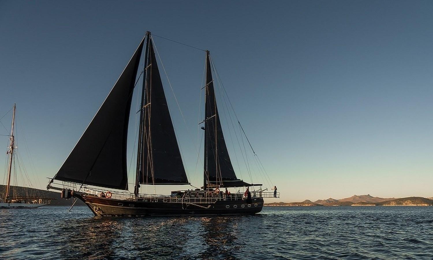 a sailboat on the water aboard CUSTOM MADE MOTORSAILOR Yacht for Sale