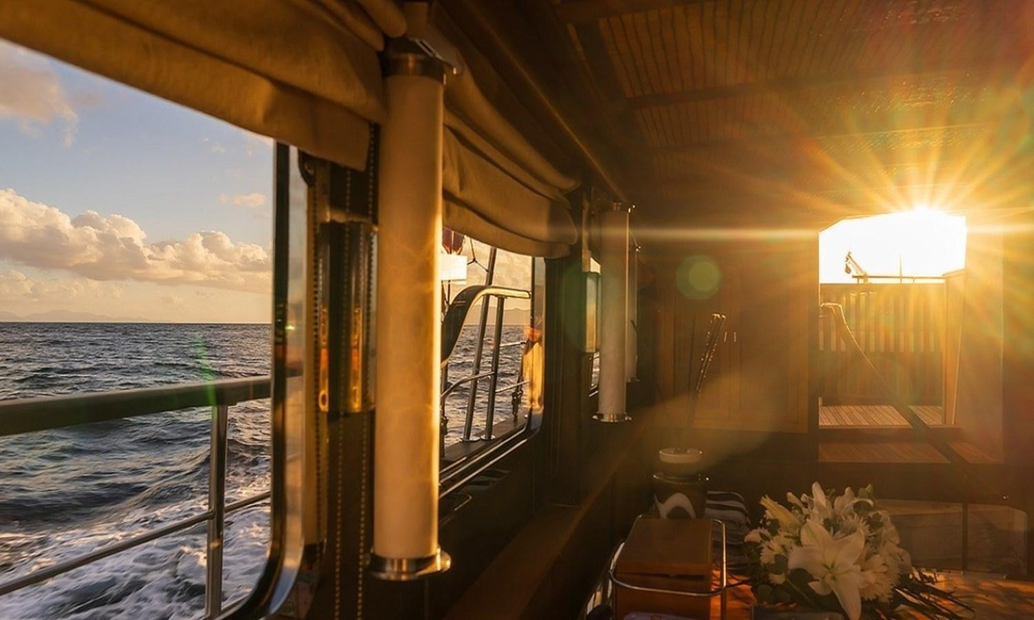 a boat on the water aboard CUSTOM MADE MOTORSAILOR Yacht for Sale