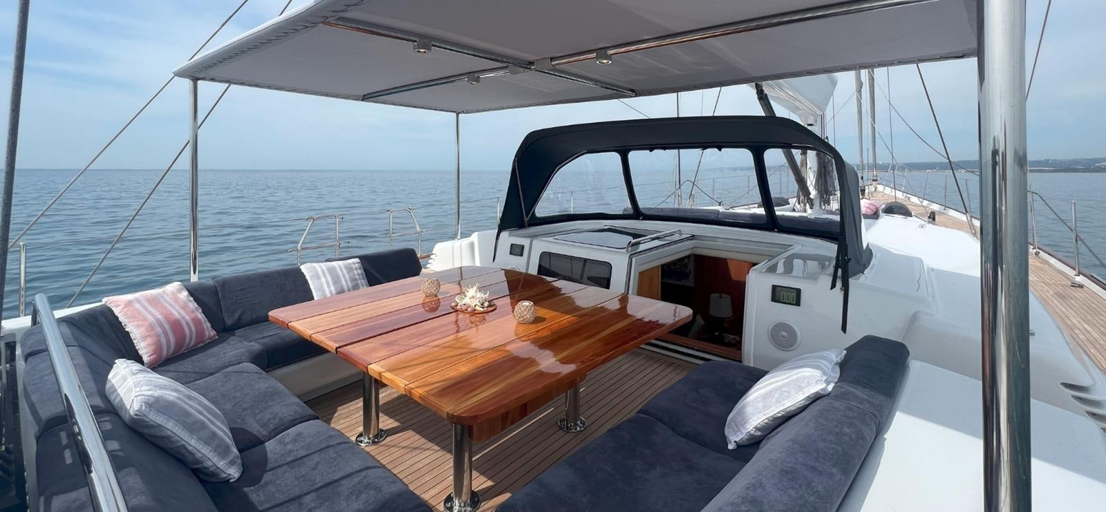 a table on a boat aboard NAOS Yacht for Sale