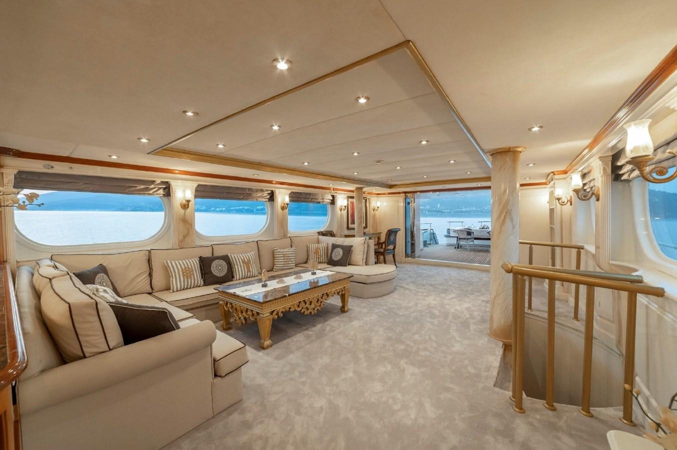 a living room with a couch and a table aboard ALKONOST Yacht for Sale