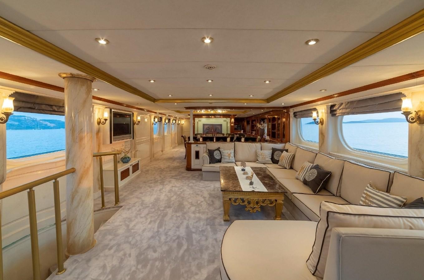 a living room with a large window aboard ALKONOST Yacht for Sale