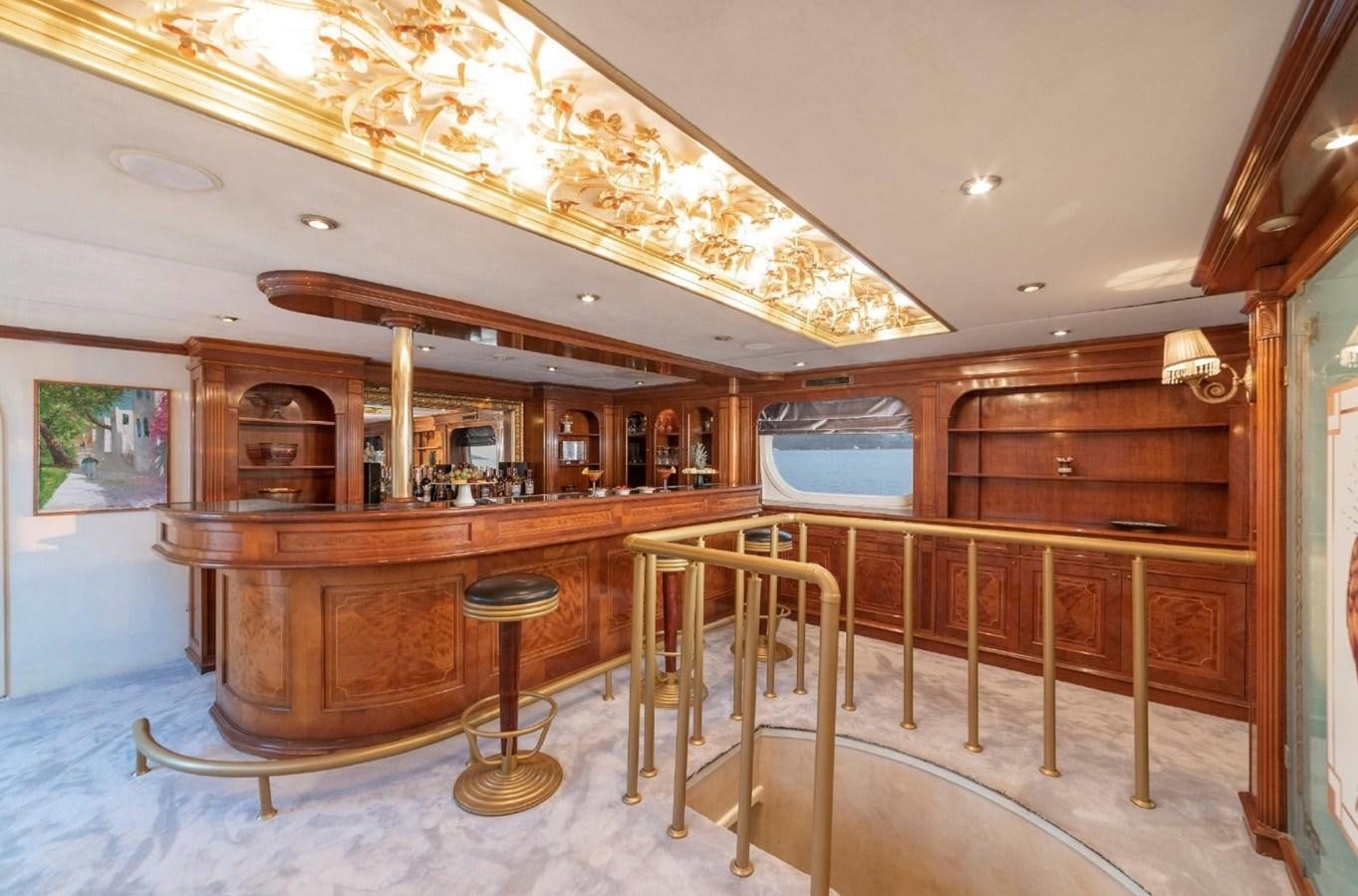 a room with a table and chairs aboard ALKONOST Yacht for Sale