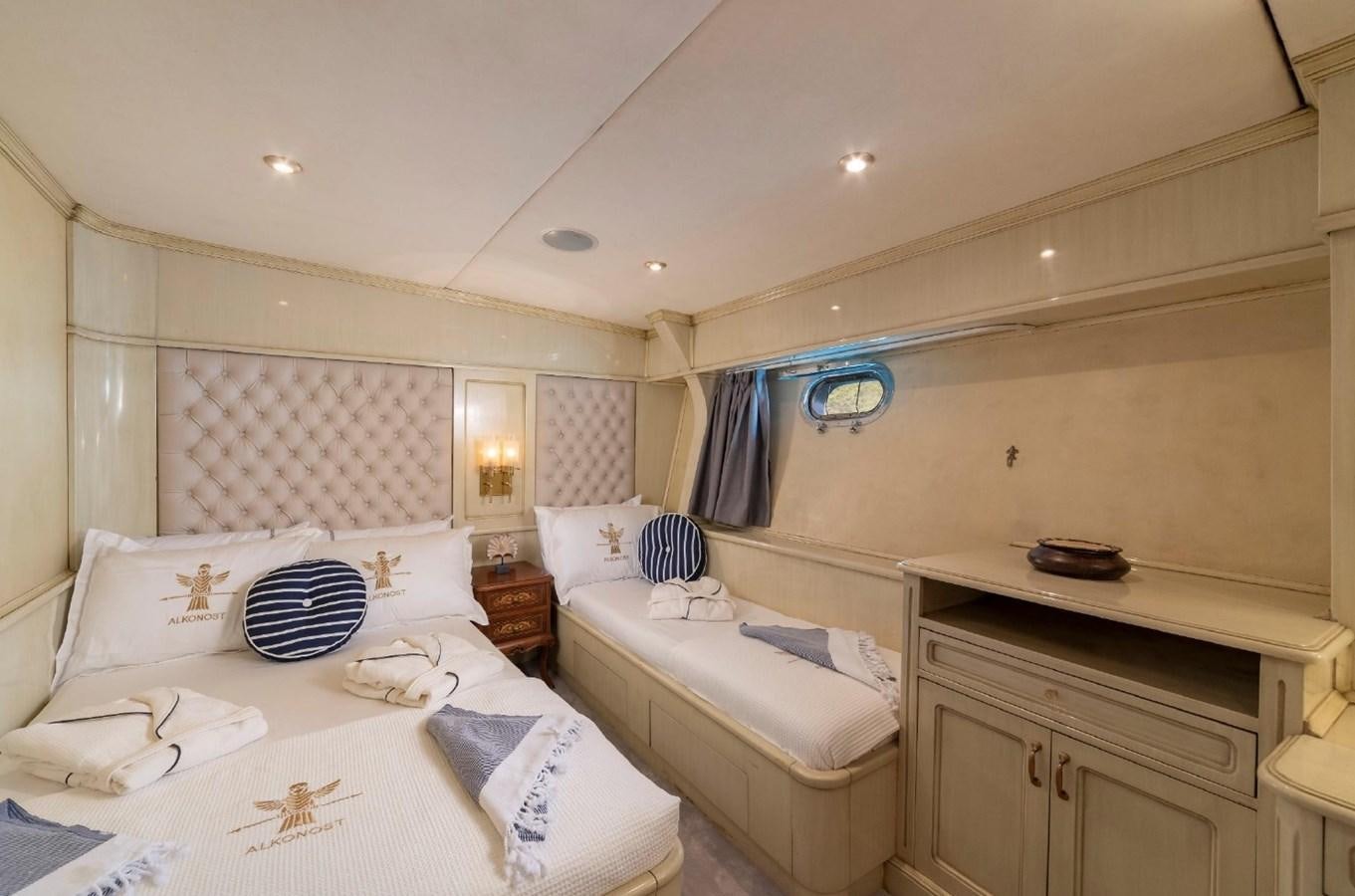 a room with two beds aboard ALKONOST Yacht for Sale