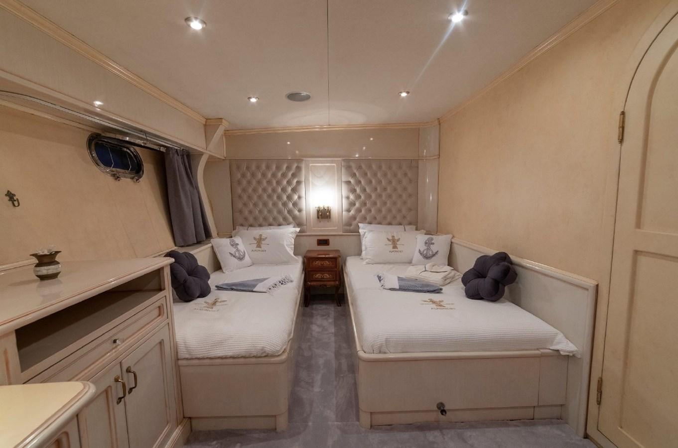 a couple of beds in a room aboard ALKONOST Yacht for Sale