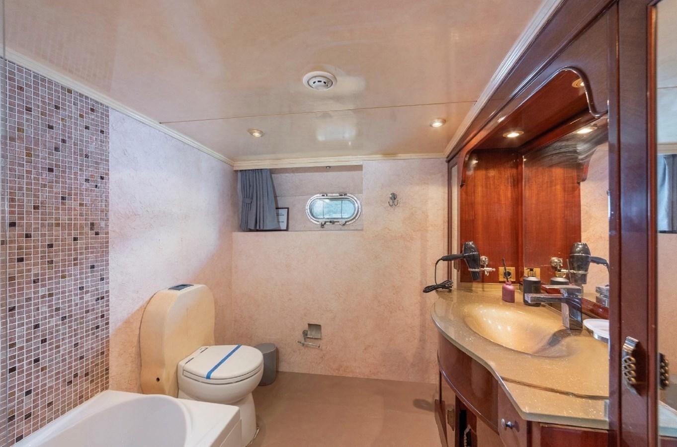 a bathroom with a sink toilet and a bathtub aboard ALKONOST Yacht for Sale