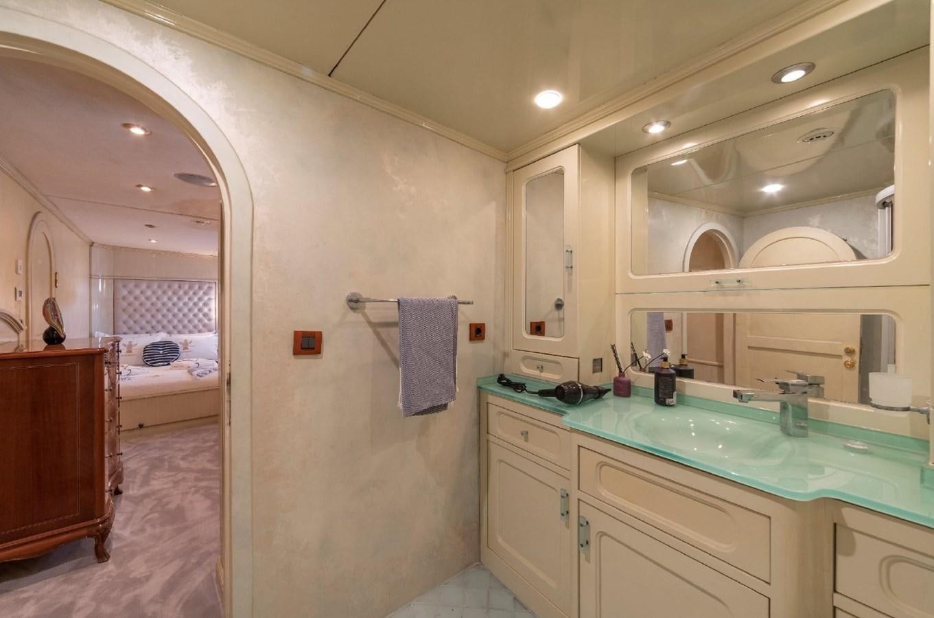 a bathroom with a large mirror aboard ALKONOST Yacht for Sale