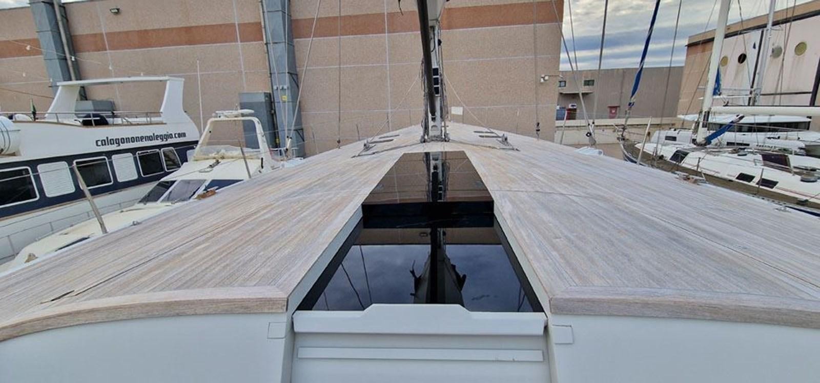 a large white boat aboard KARMA Yacht for Sale