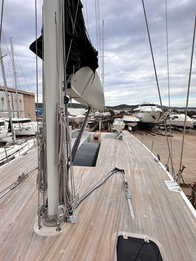 a view of a deck of a ship and a ship aboard KARMA Yacht for Sale