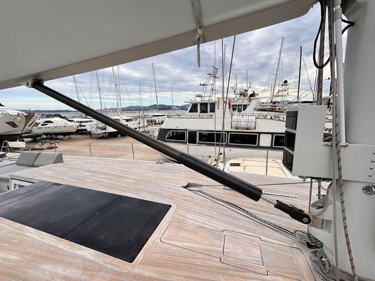 a boat on a deck aboard KARMA Yacht for Sale